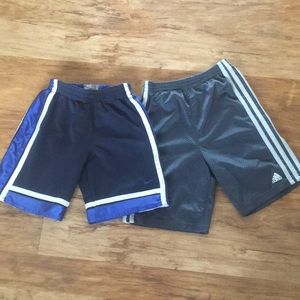 7 Boy 1 Nike and 1 Adidas short.